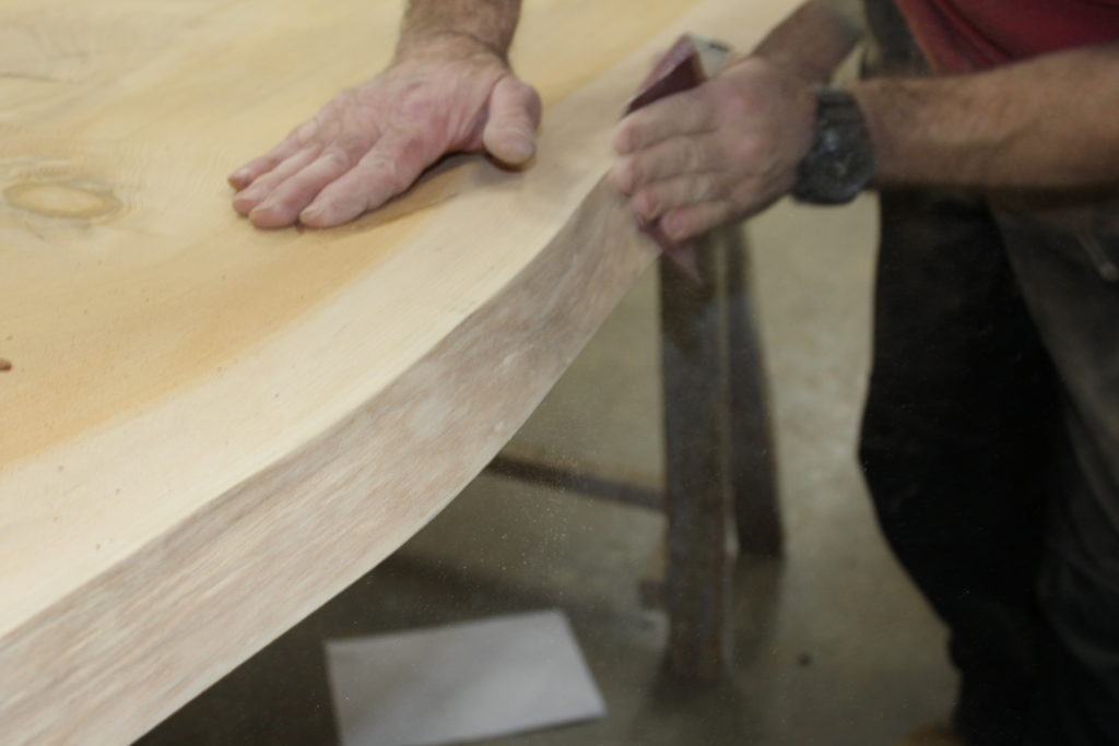 hand finishing the board